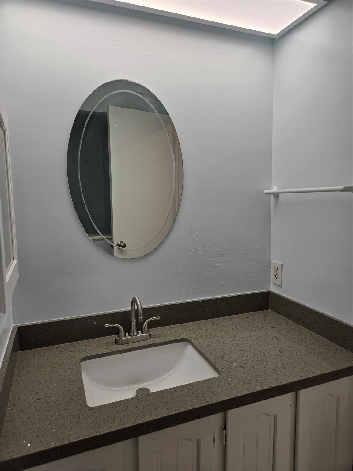 1517 Ramada Drive, Unit 1517 Houston, TX 77062 - Photo 8 of 19 a bathroom with a sink and a mirror