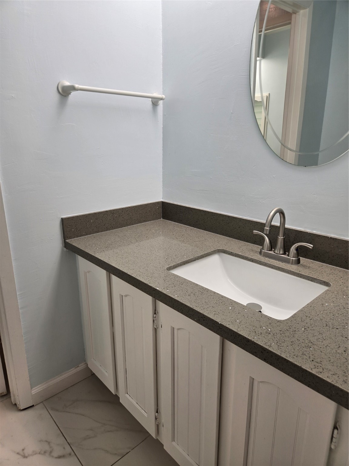1517 Ramada Drive, Unit 1517 Houston, TX 77062 - Photo 9 of 19 a bathroom with a sink and a mirror