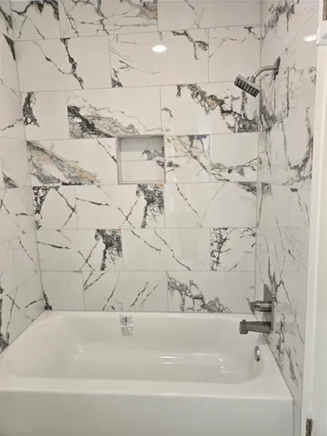 a bathroom with a bathtub
