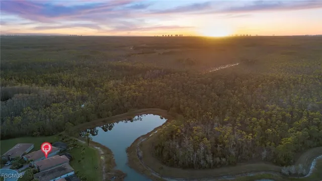 an aerial view of a house with a garden