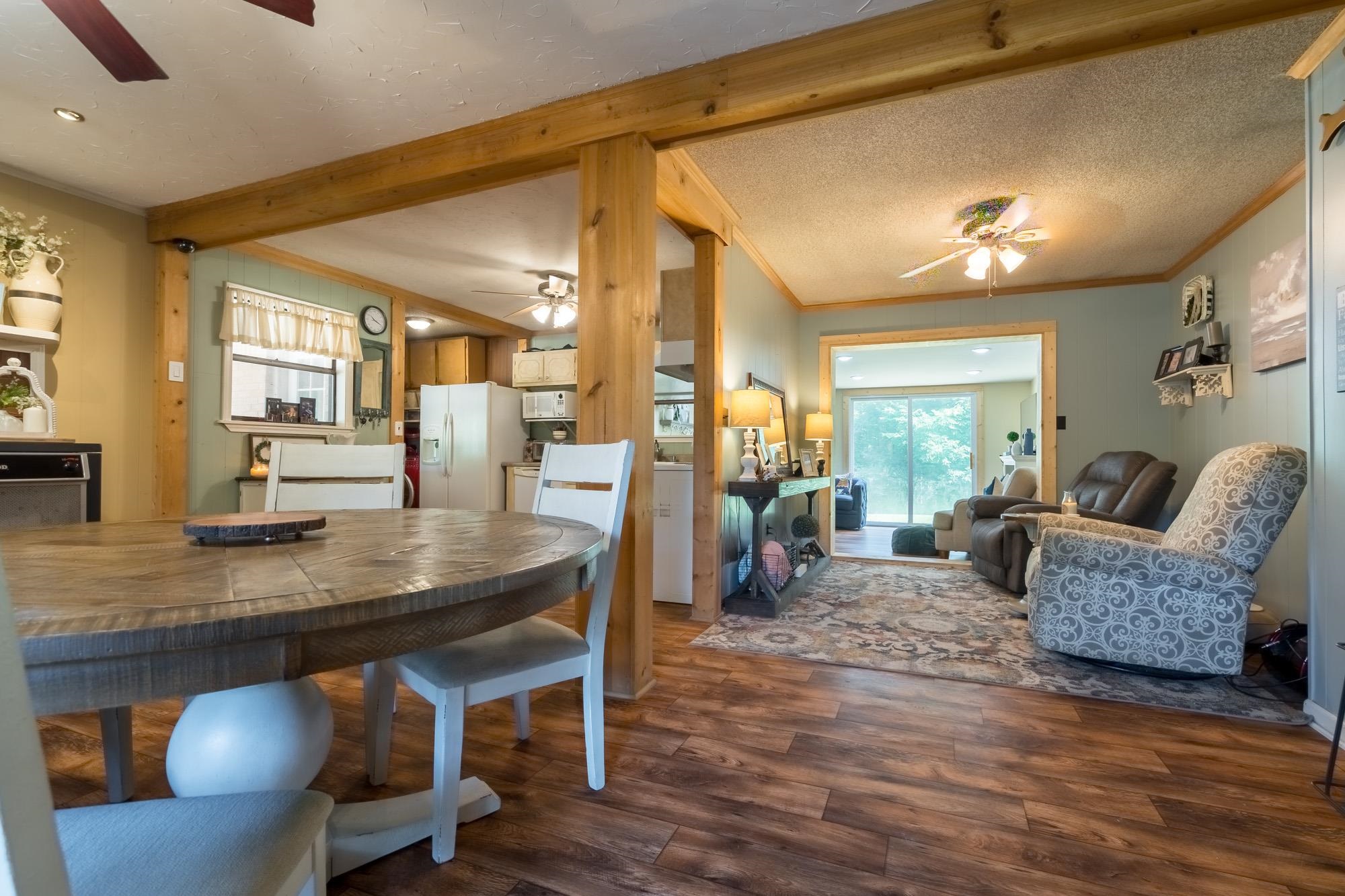 2484 Bryan Road Michigan City, MS 38647 - Photo 9 of 31 a dining room with furniture and wooden floor