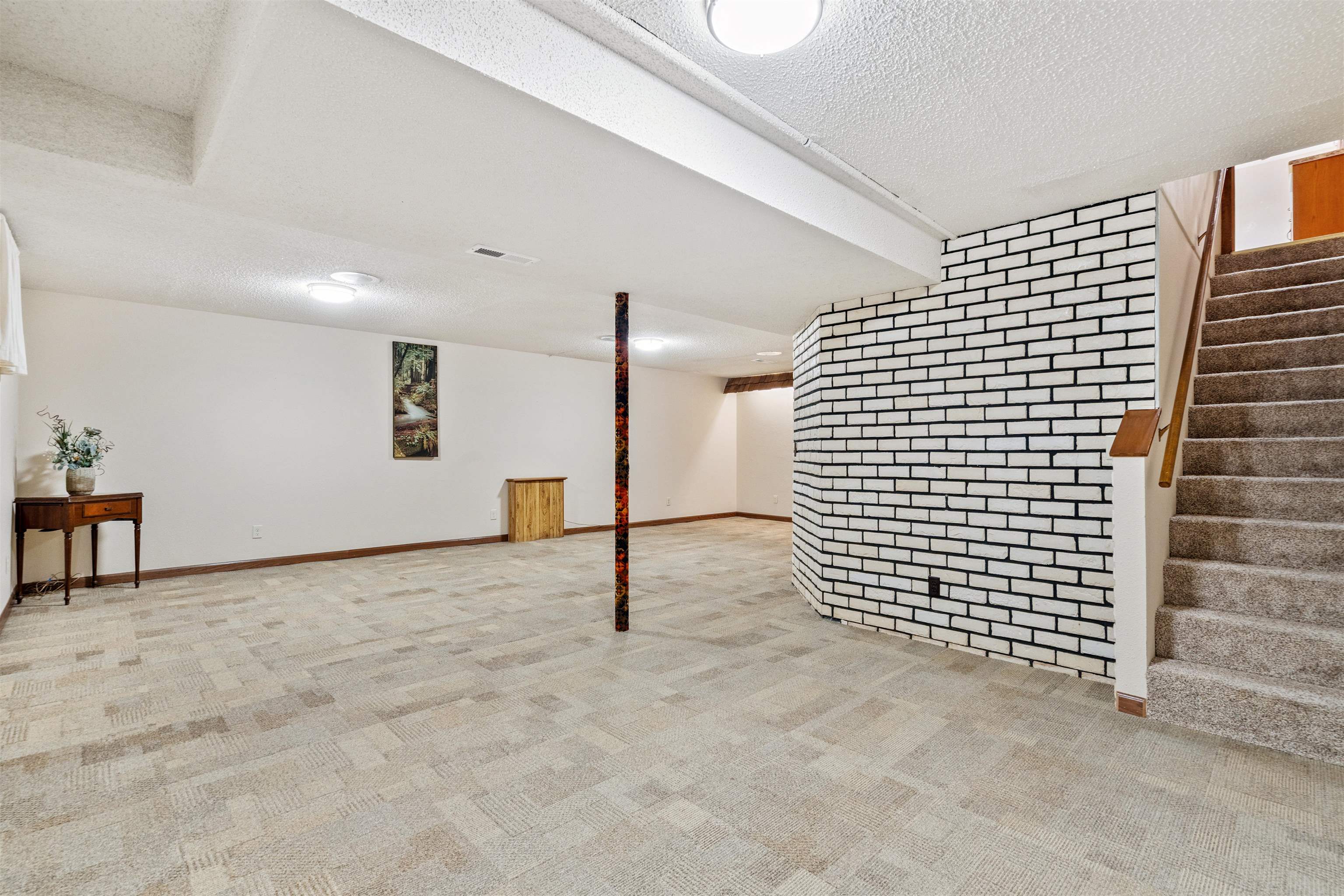 8920 Badger Road East Dubuque, IL 61025 - Photo 12 of 15 a view of a livingroom with a staircase