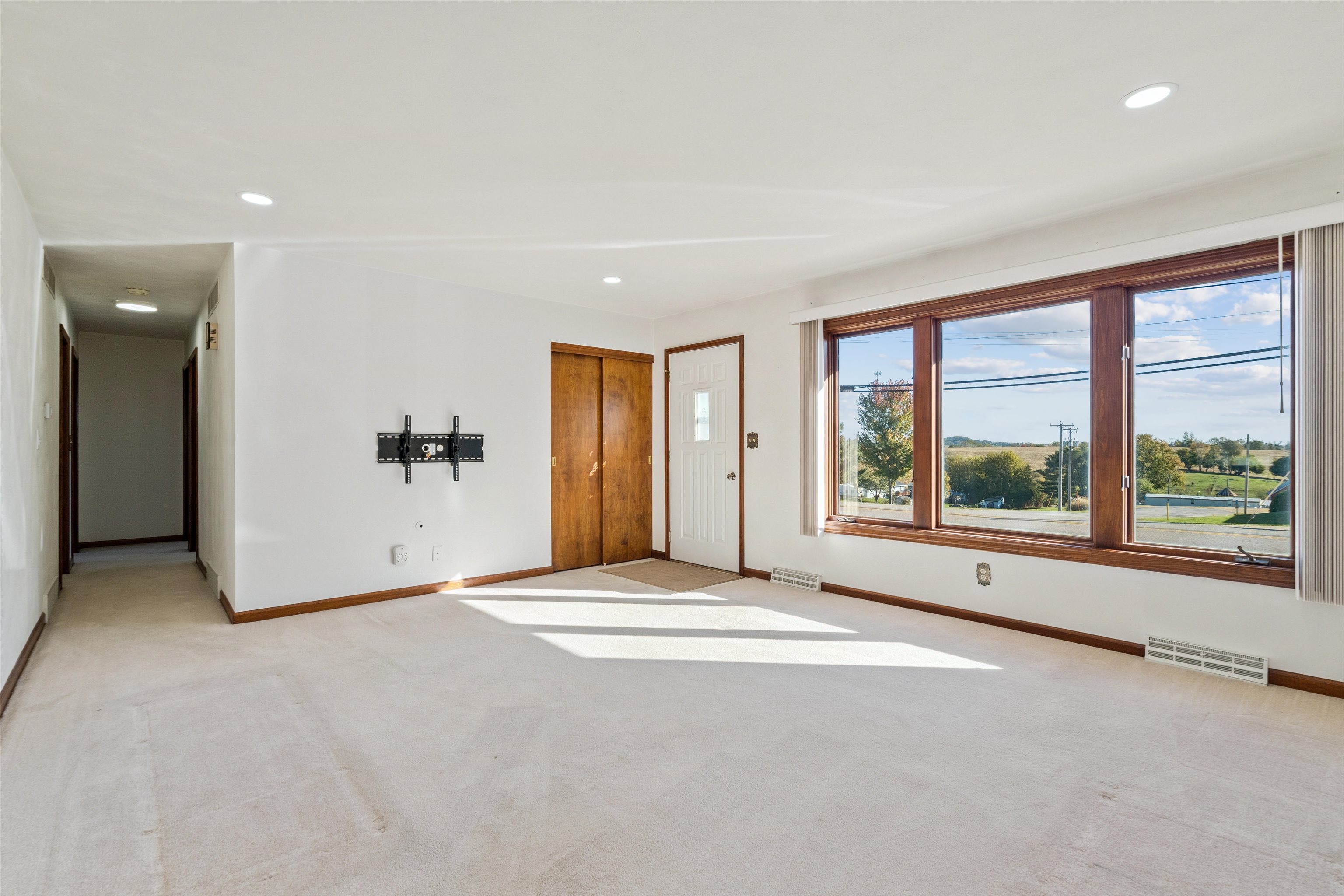 8920 Badger Road East Dubuque, IL 61025 - Photo 4 of 15 a view of an empty room with a window