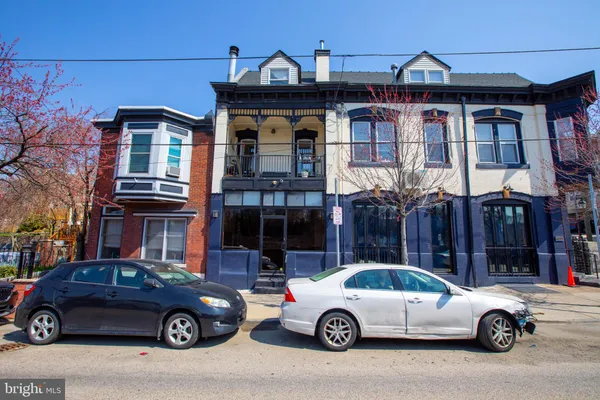 a car parked in front of a house