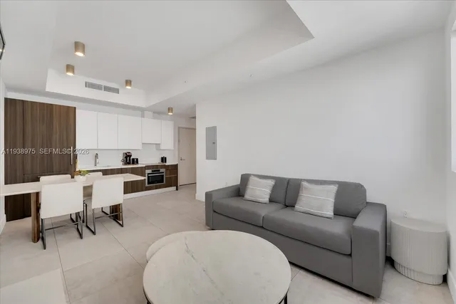 a living room with furniture and a couch