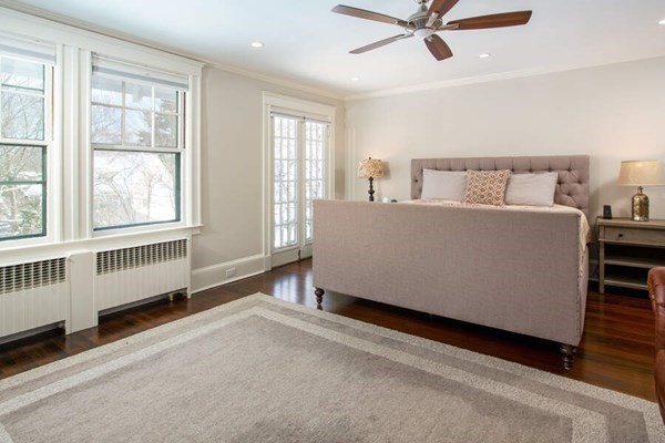 69 Evans Road Brookline, MA 02445 - Photo 11 of 24 a living room with furniture and windows