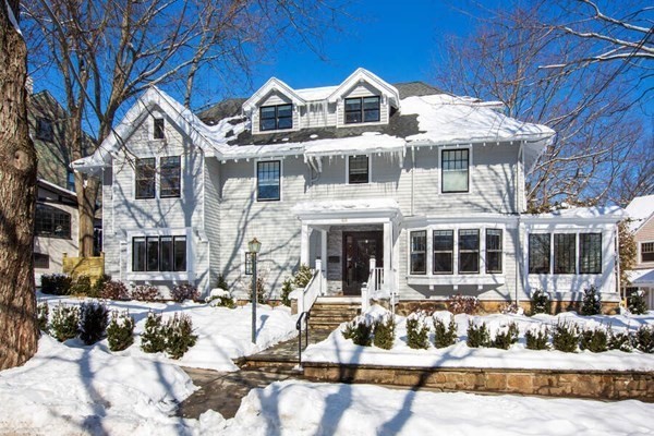 69 Evans Road Brookline, MA 02445 - Photo 19 of 24 a front view of a house with a yard
