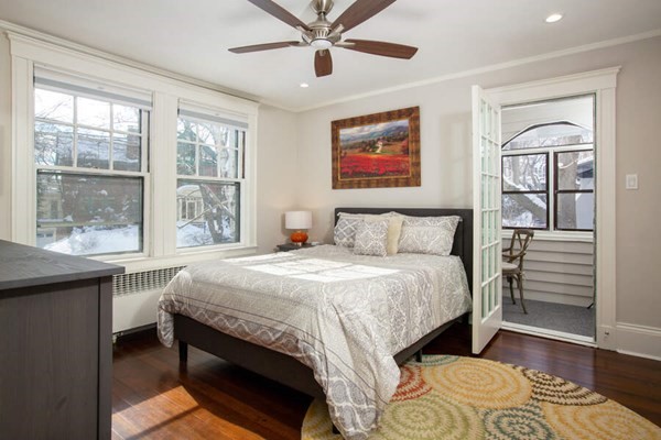 69 Evans Road Brookline, MA 02445 - Photo 24 of 24 a bedroom with a bed and a window