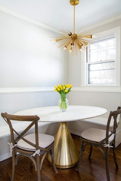 69 Evans Road Brookline, MA 02445 - Photo 9 of 24 a dining room with furniture and window