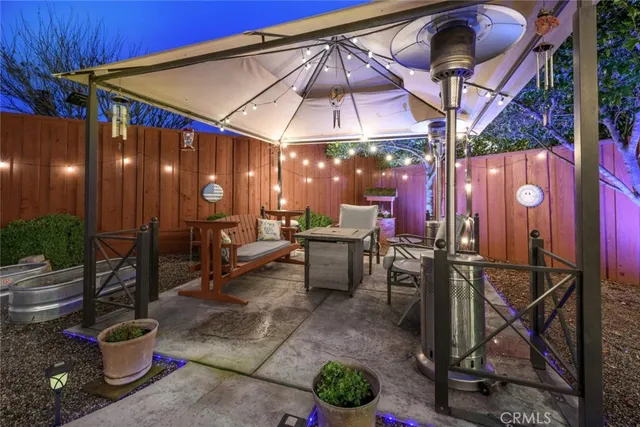 a view of a chairs and tables in patio
