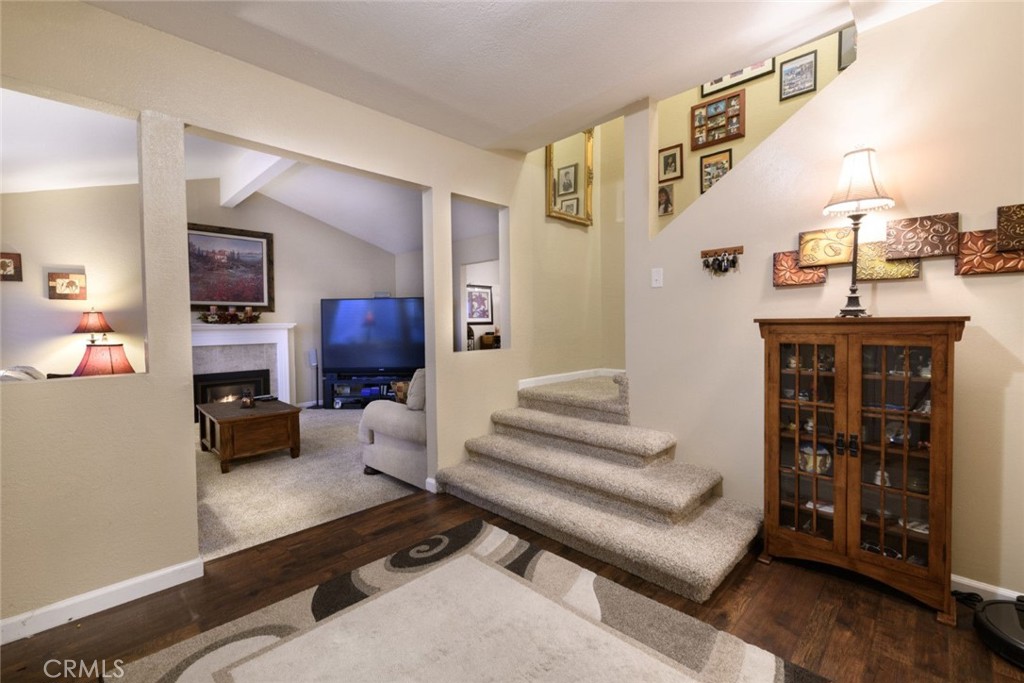 6565 Princevalle Street Gilroy, CA 95020 - Photo 16 of 27 a living room with furniture and wooden floor