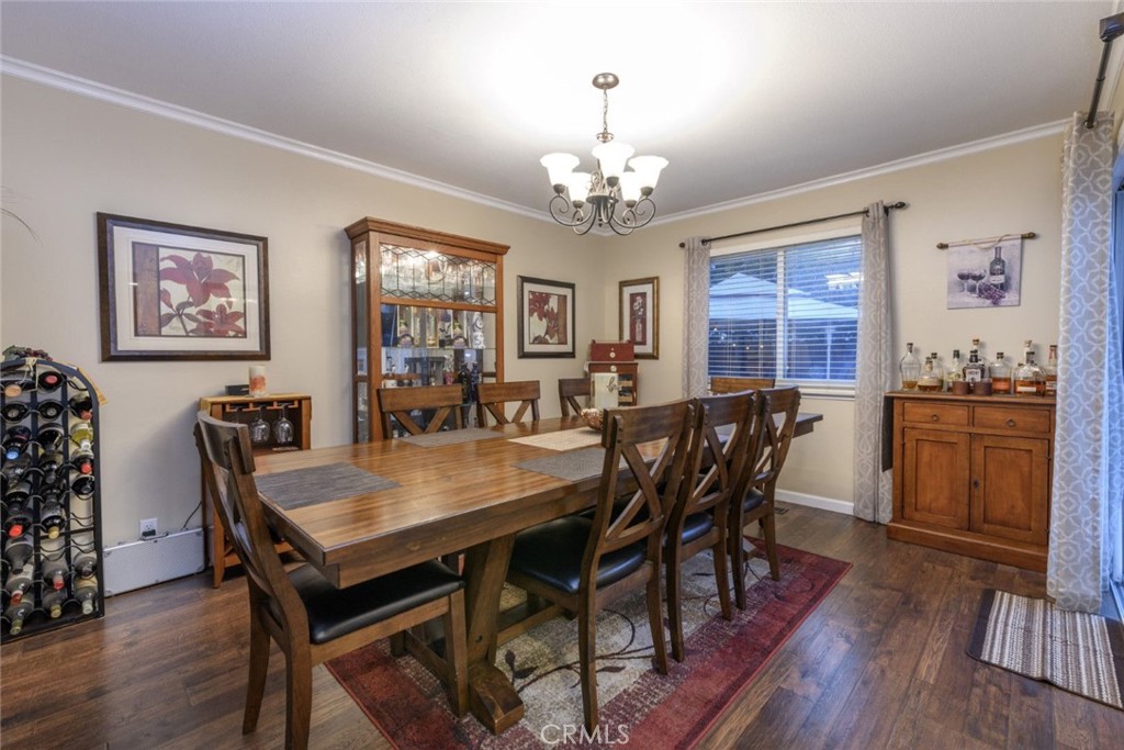 6565 Princevalle Street Gilroy, CA 95020 - Photo 8 of 27 a view of a dining room with furniture window and wooden floor
