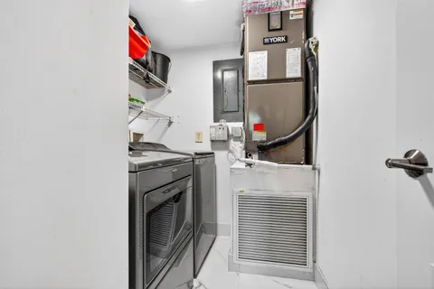 a view of a kitchen storage and utility room