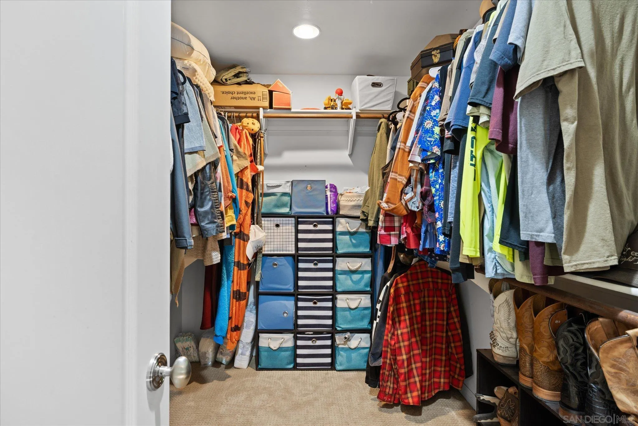 1714 Foss Road Alpine, CA 91901 - Photo 23 of 62 a view of walk in closet with clothes and shoes