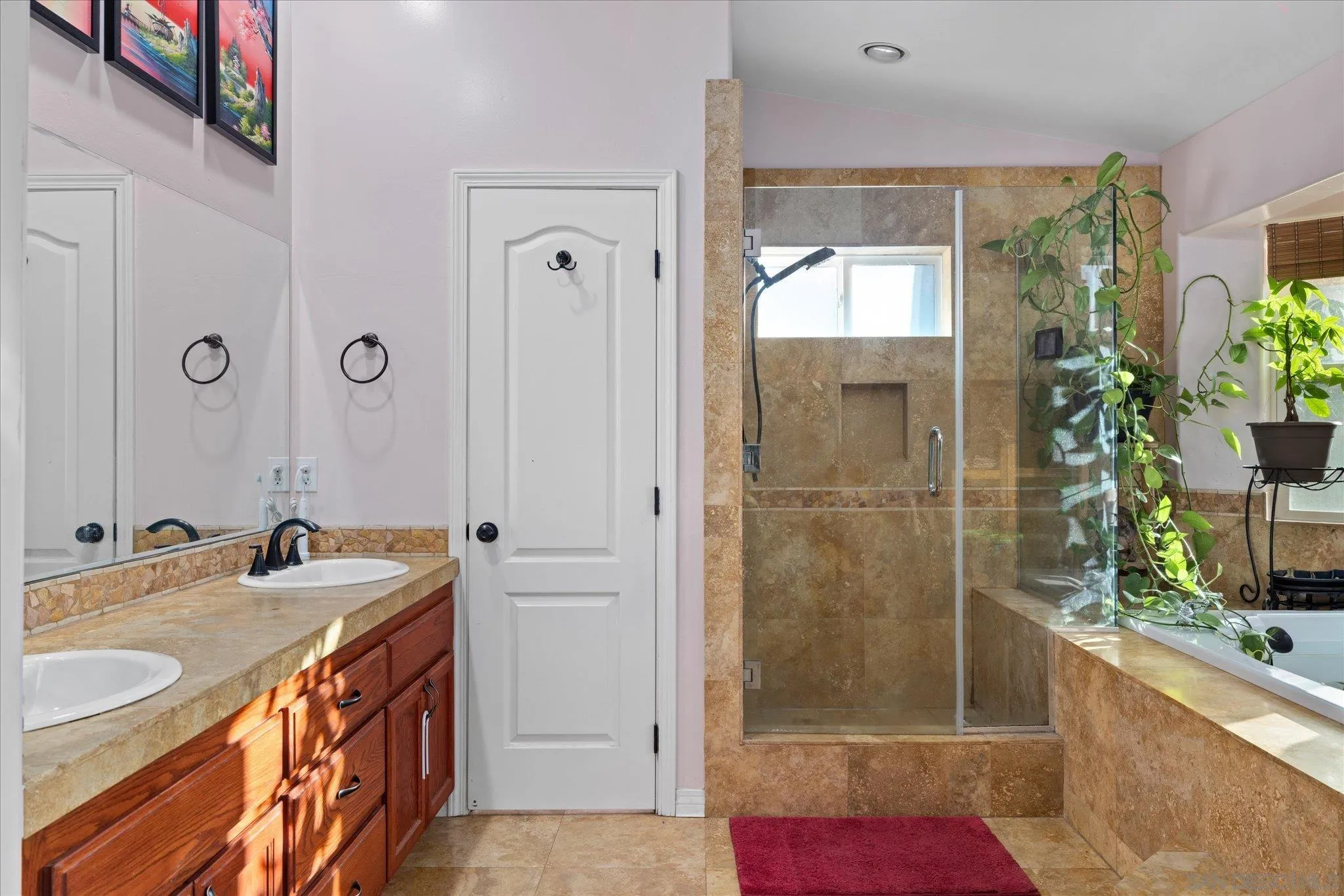 1714 Foss Road Alpine, CA 91901 - Photo 24 of 62 a bathroom with a granite countertop sink a large mirror and shower