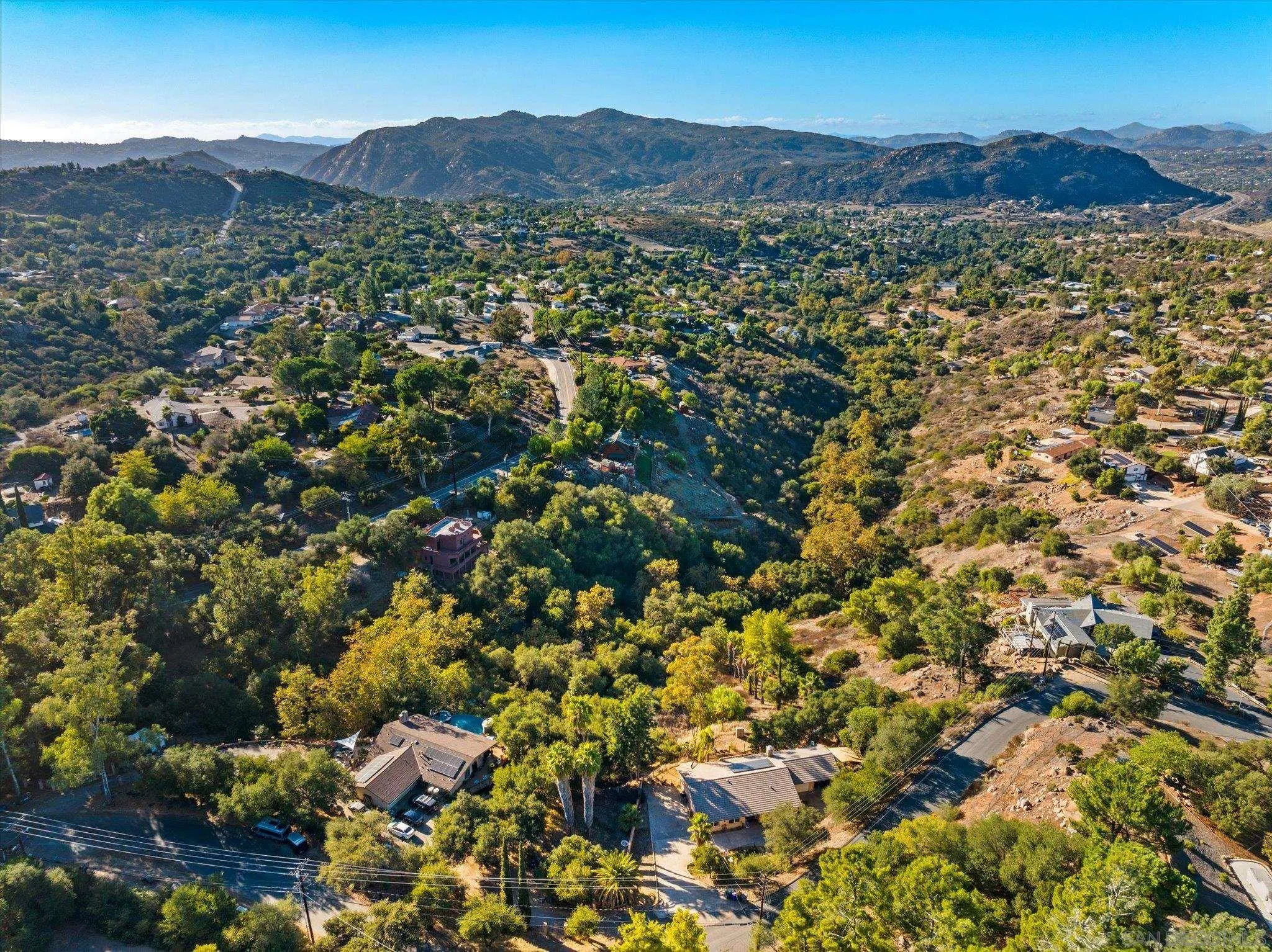 1714 Foss Road Alpine, CA 91901 - Photo 48 of 62 a view of a house with a mountain in the background