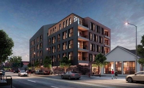 a view of a building and a street