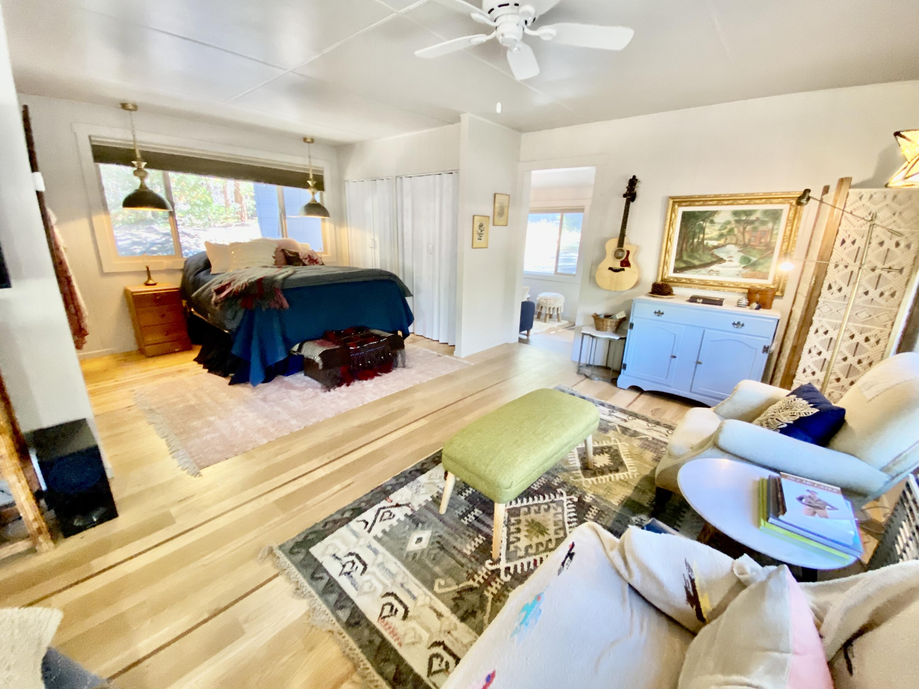 53080 4s02 Idyllwild, CA 92549 - Photo 14 of 77 a bedroom with a bed and wooden floor