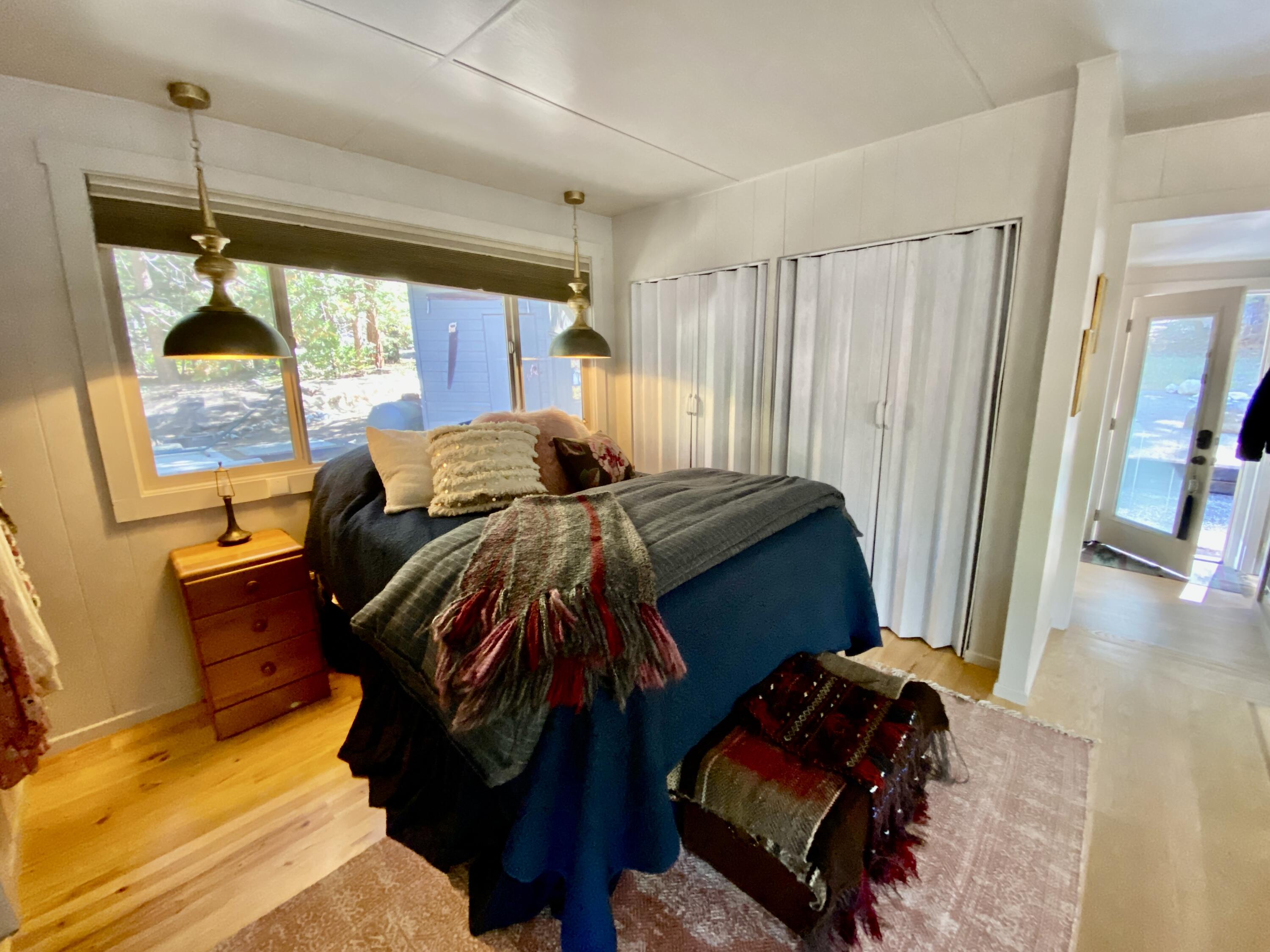53080 4s02 Idyllwild, CA 92549 - Photo 19 of 77 a bedroom with a bed and a window