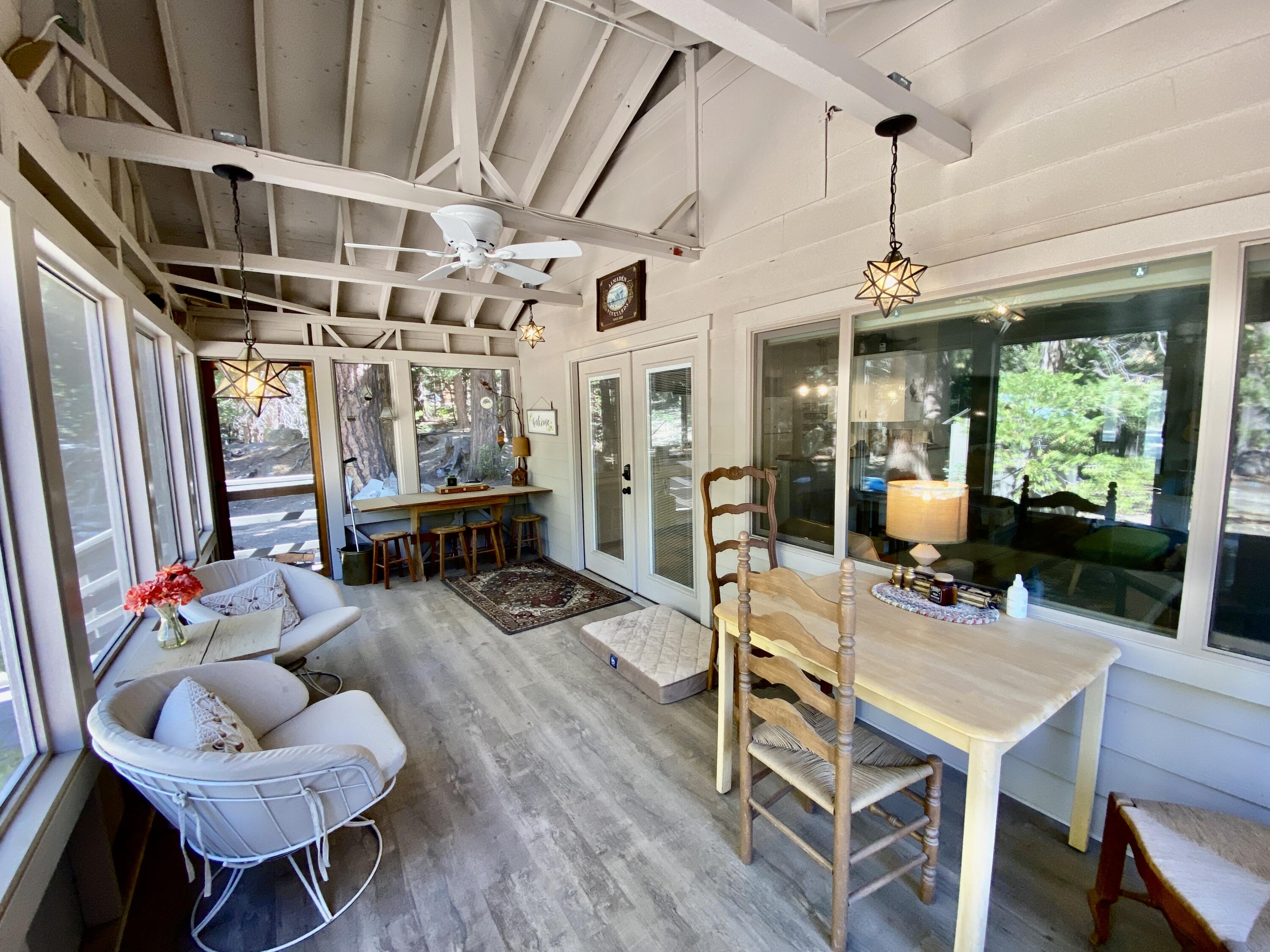 53080 4s02 Idyllwild, CA 92549 - Photo 3 of 77 a outdoor space with lots of furniture and wooden floor