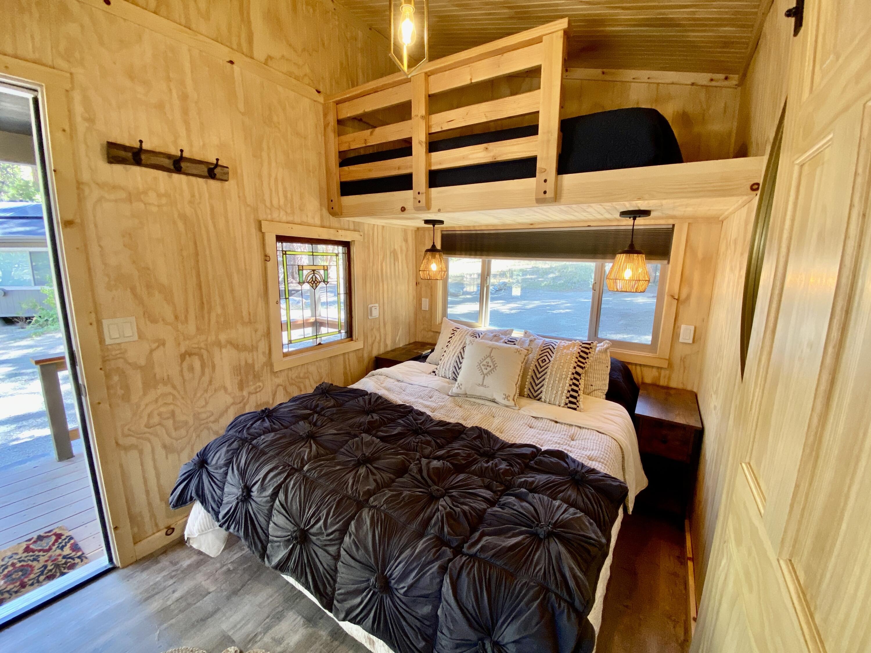 53080 4s02 Idyllwild, CA 92549 - Photo 32 of 77 a bed sitting in a bedroom next to a window
