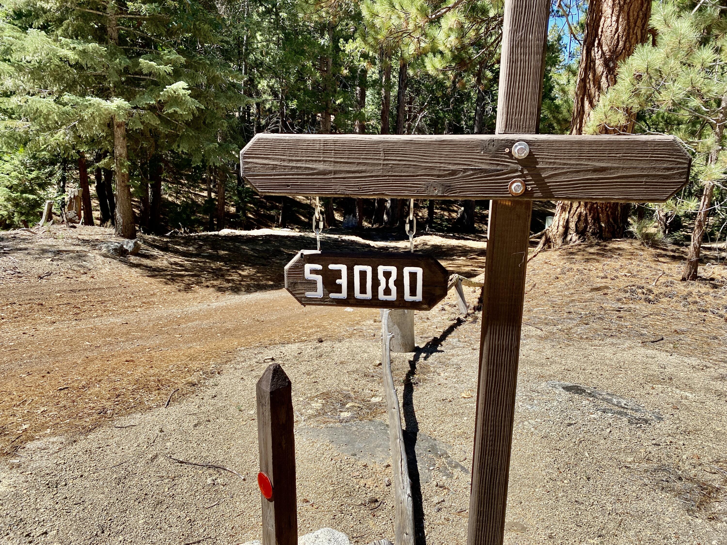 53080 4s02 Idyllwild, CA 92549 - Photo 36 of 77 a view of a wooden house with a yard