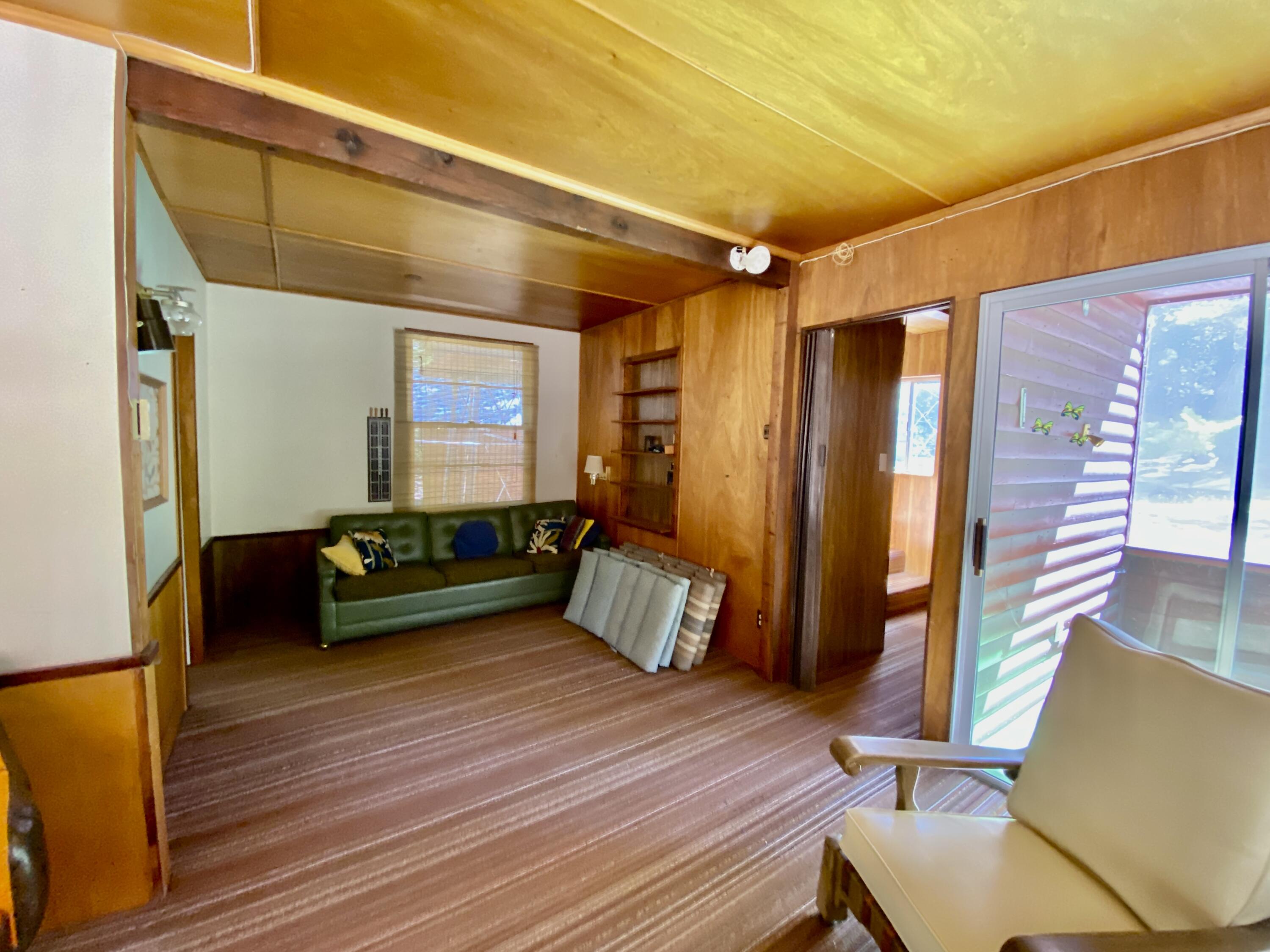 53080 4s02 Idyllwild, CA 92549 - Photo 48 of 77 a living room with furniture and wooden floor