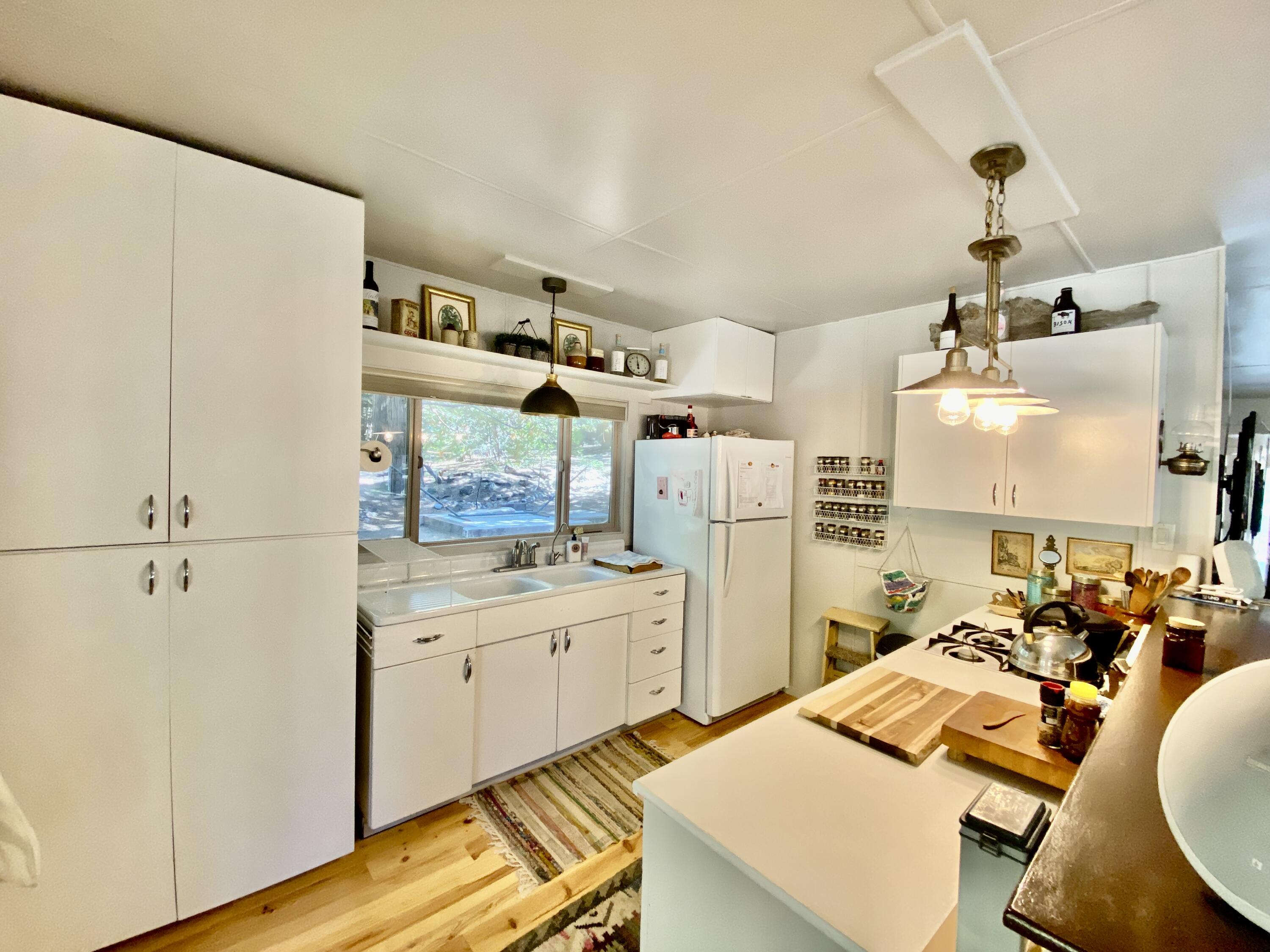 53080 4s02 Idyllwild, CA 92549 - Photo 6 of 77 a kitchen with a sink appliances and cabinets