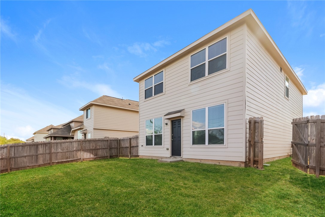 1003 Harper Lane Bryan, TX 77803 - Photo 14 of 15 a view of a house with backyard