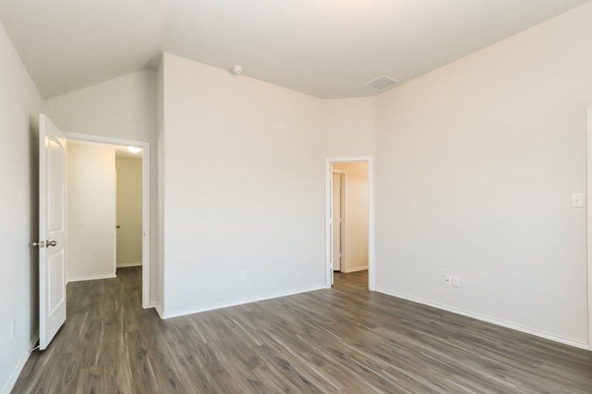 1003 Harper Lane Bryan, TX 77803 - Photo 10 of 15 a view of hallway with wooden floor