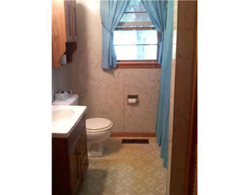 187 West Main Street Milo, ME 04463 - Photo 10 of 12 Bedroom. Cute bathroom, with linen...