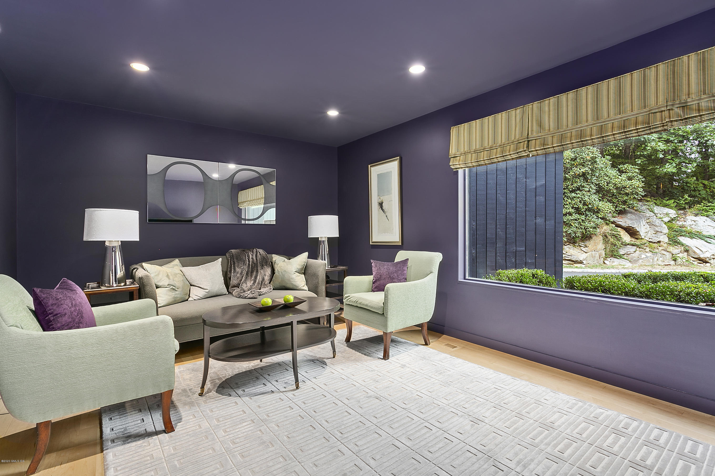 9 Chateau Ridge Drive Greenwich, CT 06831 - Photo 15 of 34 a living room with furniture and a large window