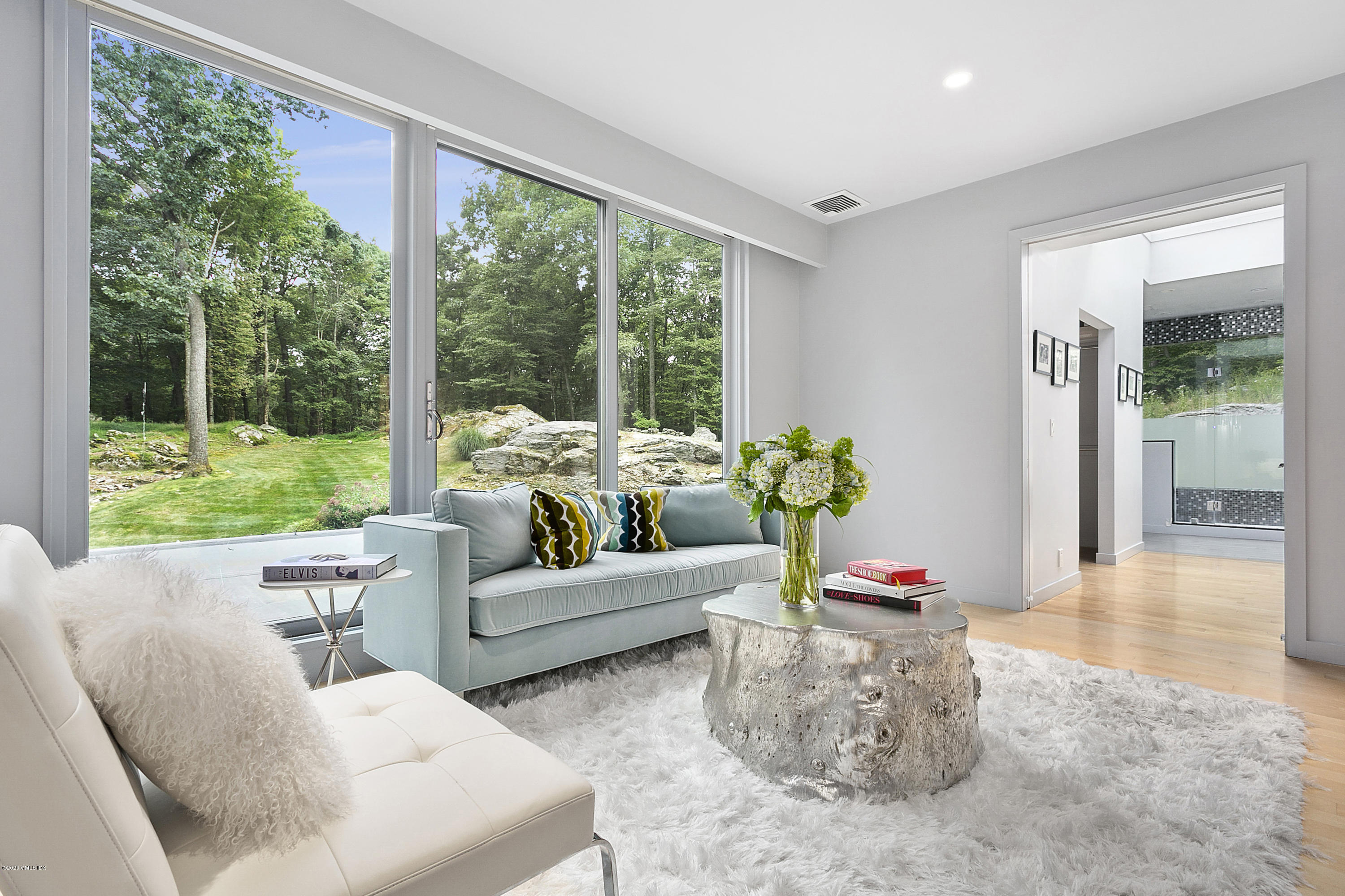 9 Chateau Ridge Drive Greenwich, CT 06831 - Photo 19 of 34 a living room with furniture and a large window