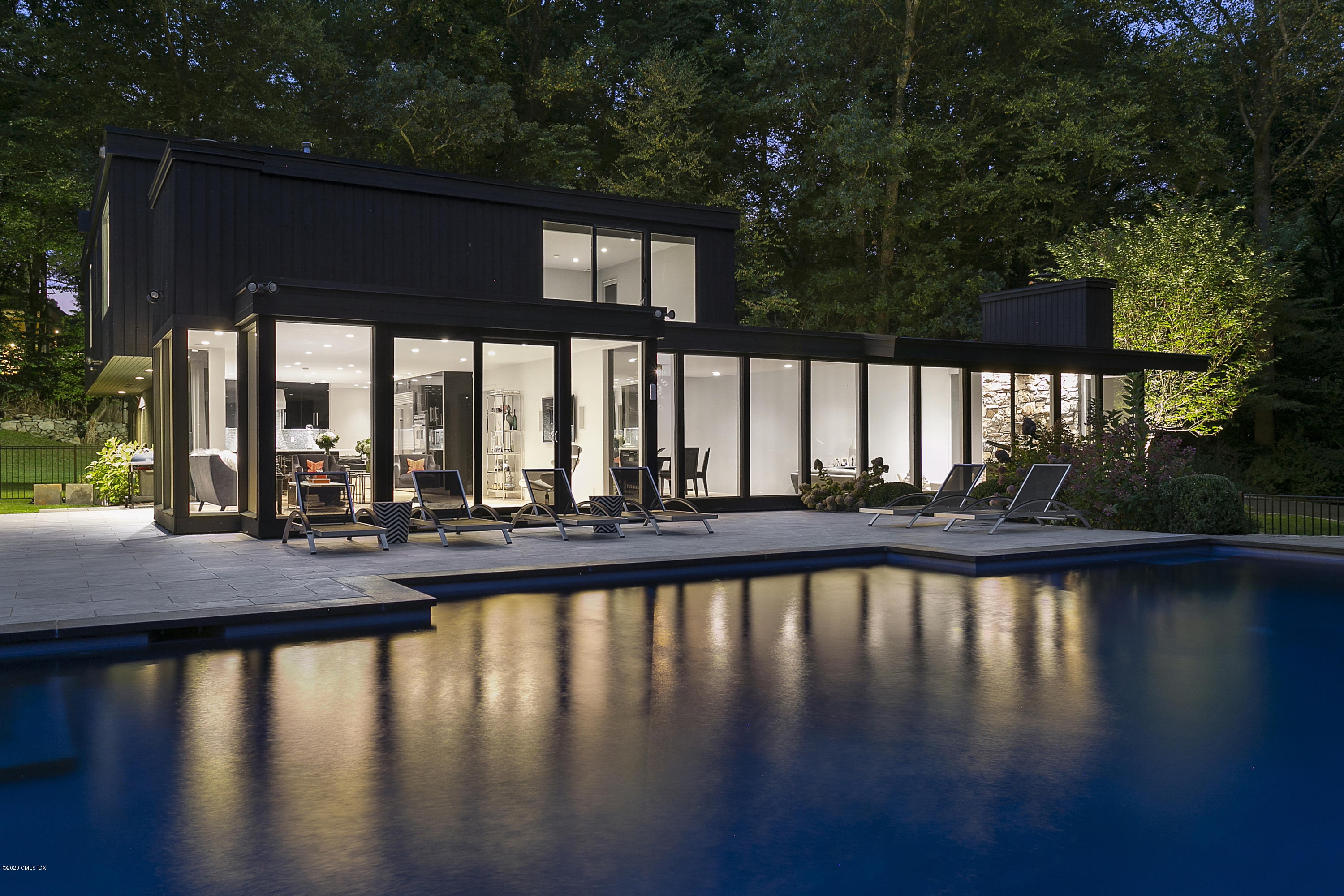 9 Chateau Ridge Drive Greenwich, CT 06831 - Photo 28 of 34 a view of swimming pool with outdoor seating