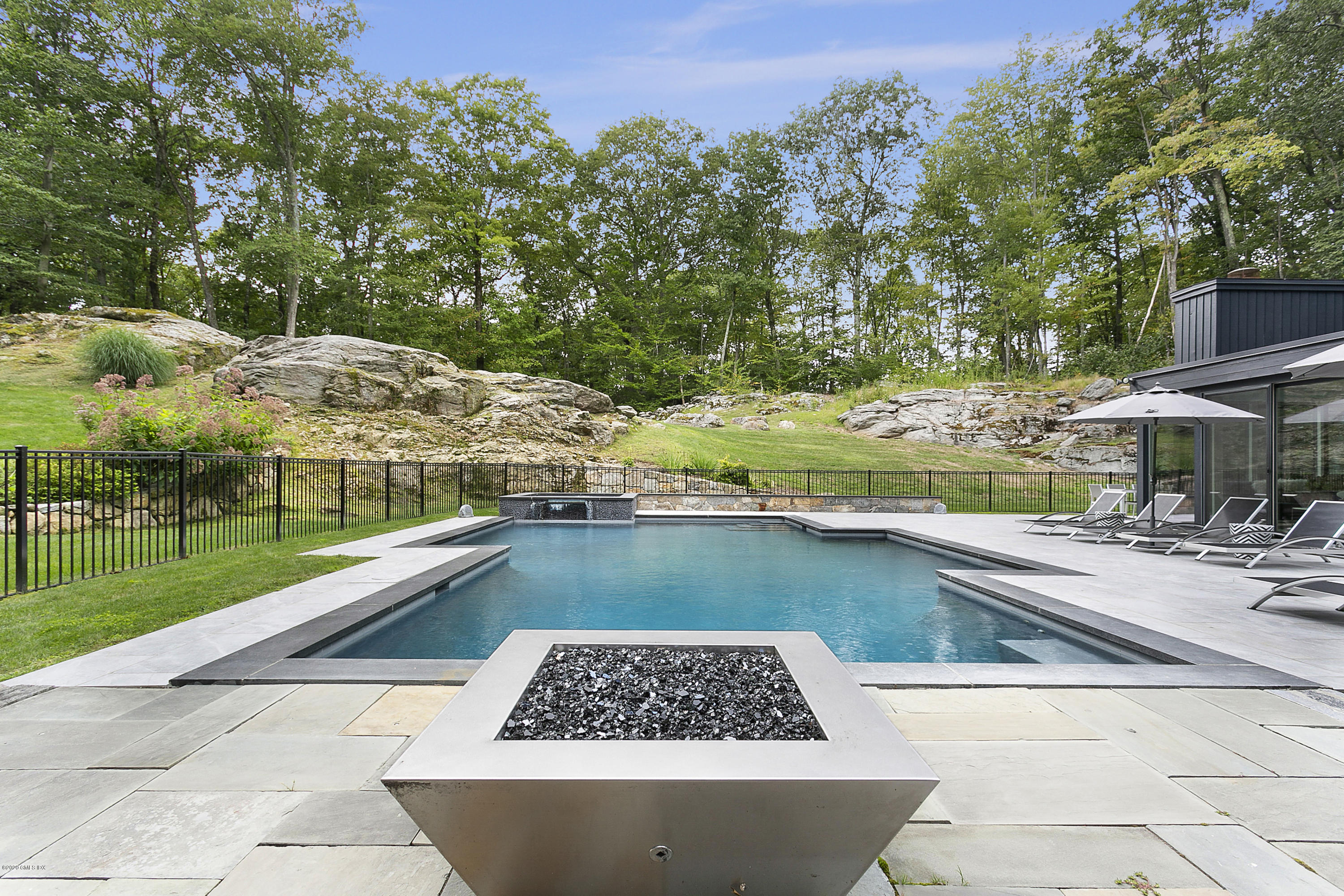 9 Chateau Ridge Drive Greenwich, CT 06831 - Photo 33 of 34 a view of a backyard