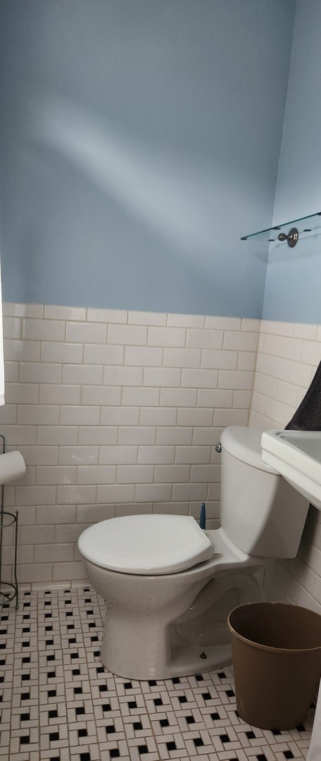 927 Clark Street Marseilles, IL 61341 - Photo 12 of 25 a bathroom with a toilet and a sink