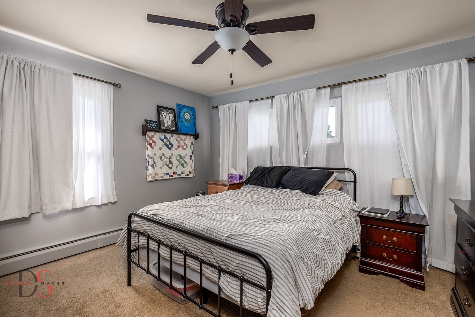 927 Clark Street Marseilles, IL 61341 - Photo 14 of 25 a bedroom with a bed and a chandelier