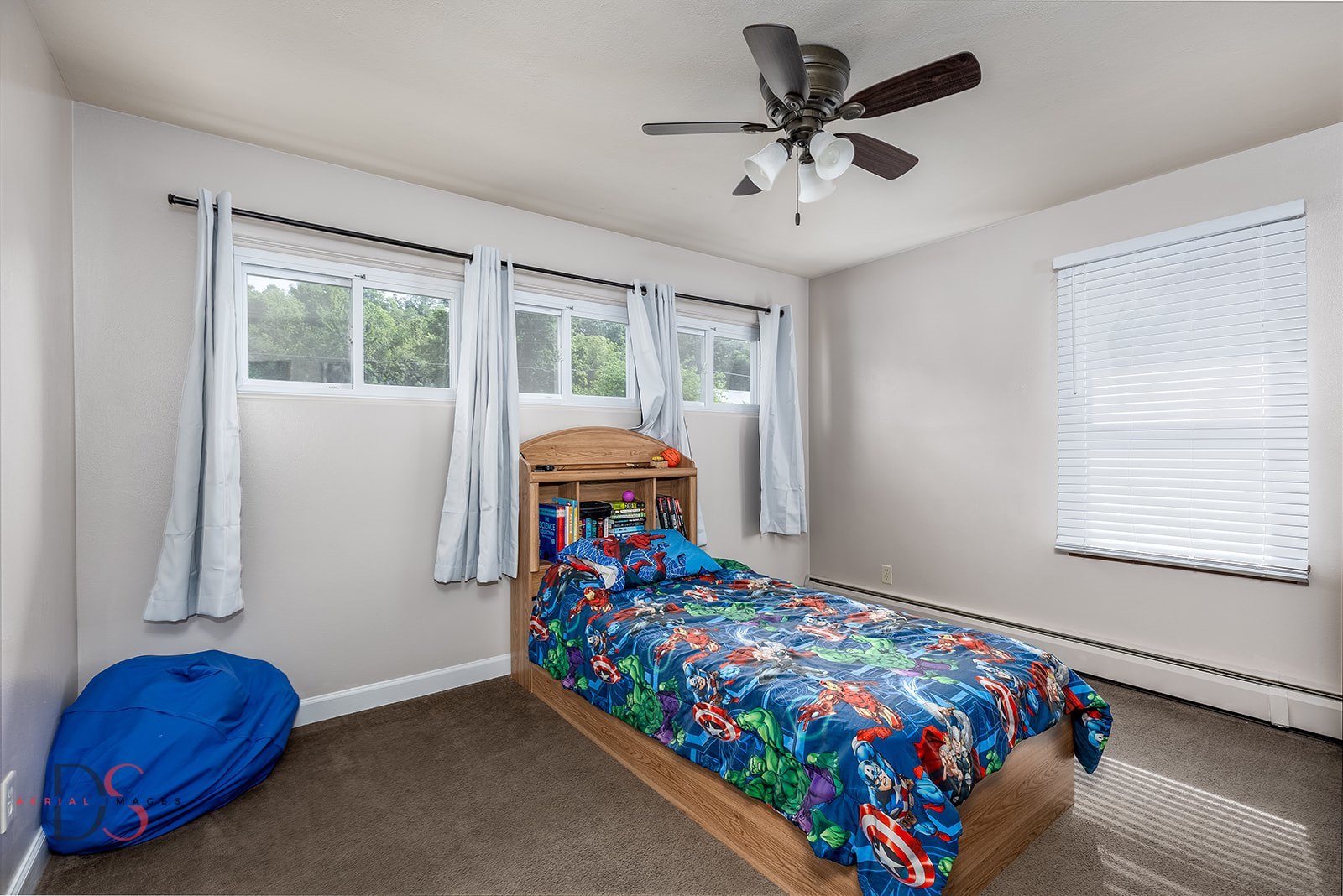 927 Clark Street Marseilles, IL 61341 - Photo 16 of 25 a bed sitting in a bedroom next to a window