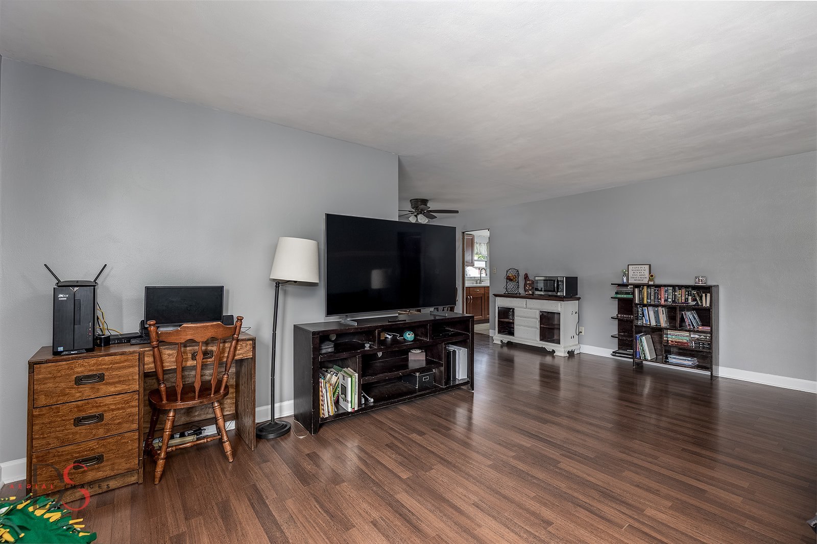 927 Clark Street Marseilles, IL 61341 - Photo 6 of 25 a living room with furniture and a flat screen tv