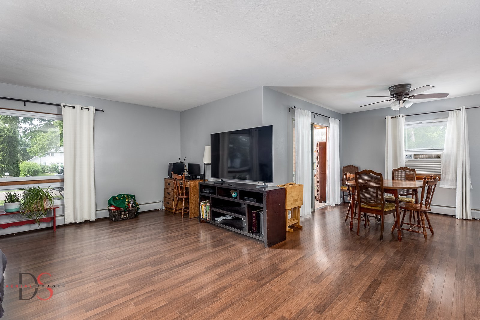 927 Clark Street Marseilles, IL 61341 - Photo 7 of 25 a living room with furniture and a flat screen tv