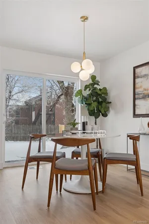 a table room with furniture and wooden floor