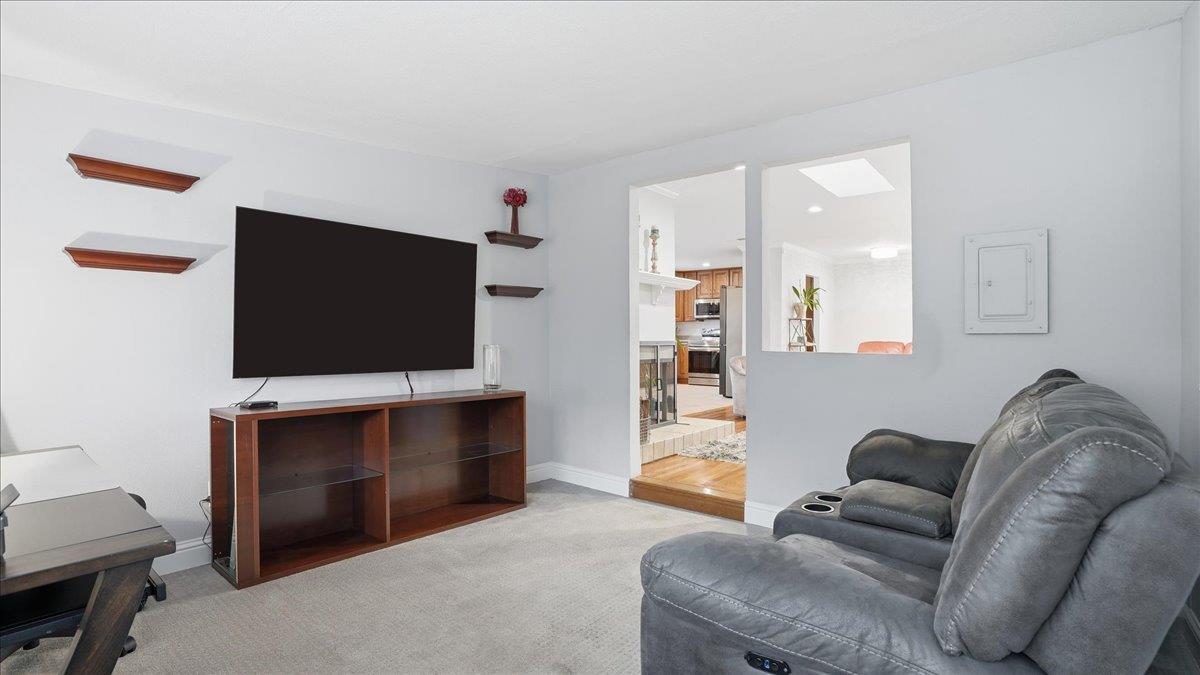 5701 Chipping Way Citrus Heights, CA 95621 - Photo 18 of 41 a living room with furniture and a flat screen tv