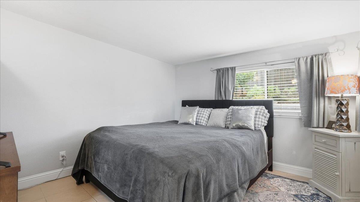 5701 Chipping Way Citrus Heights, CA 95621 - Photo 19 of 41 a bed sitting in a bedroom next to a window