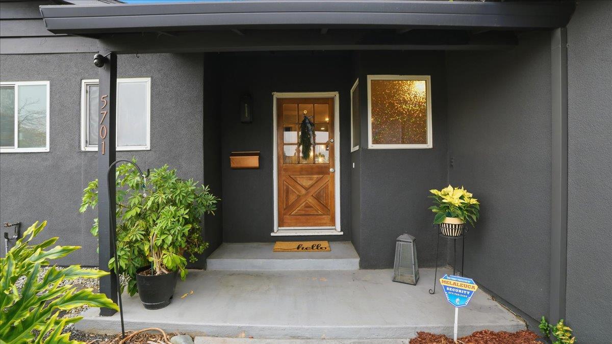 5701 Chipping Way Citrus Heights, CA 95621 - Photo 2 of 41 a potted plant sitting on the side of a building