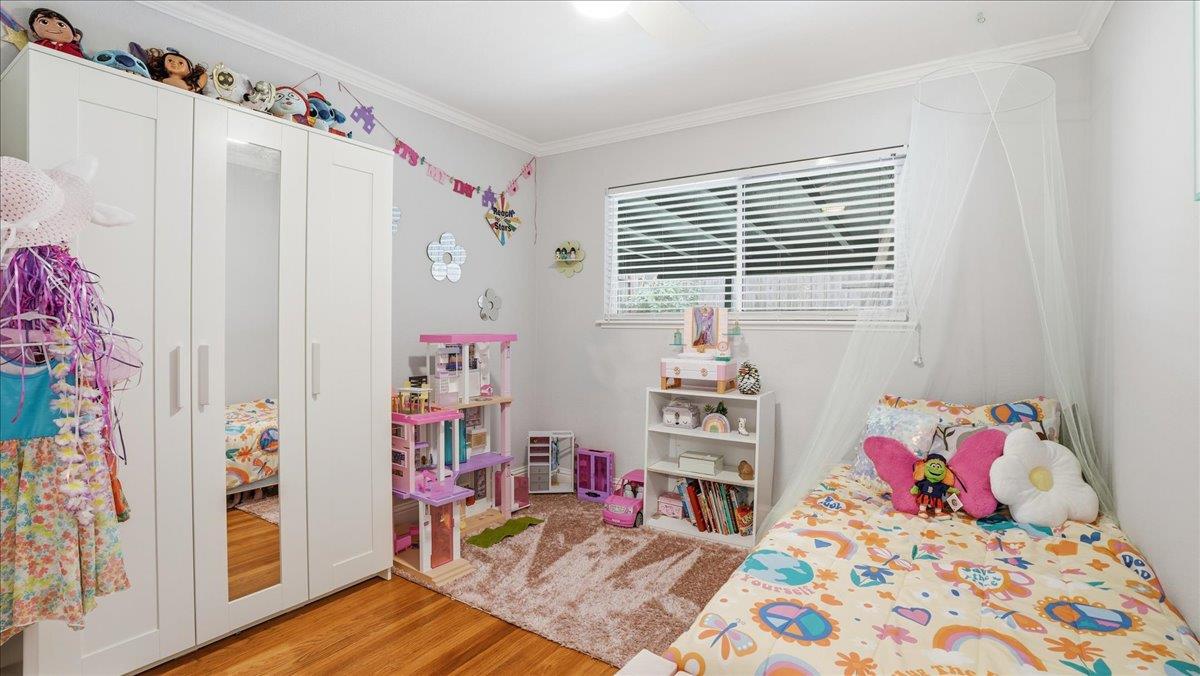 5701 Chipping Way Citrus Heights, CA 95621 - Photo 21 of 41 a bedroom with a bed and a window