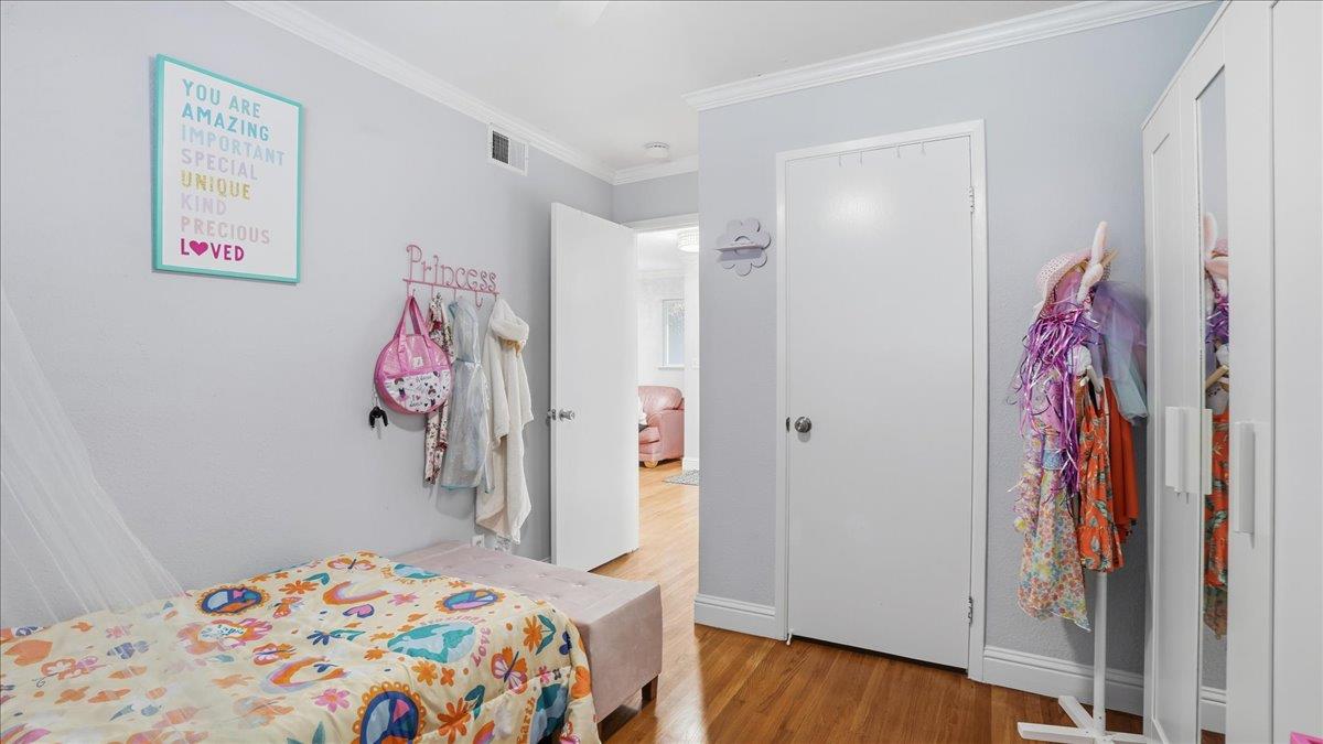 5701 Chipping Way Citrus Heights, CA 95621 - Photo 22 of 41 a bedroom with a bed and a view of bathroom