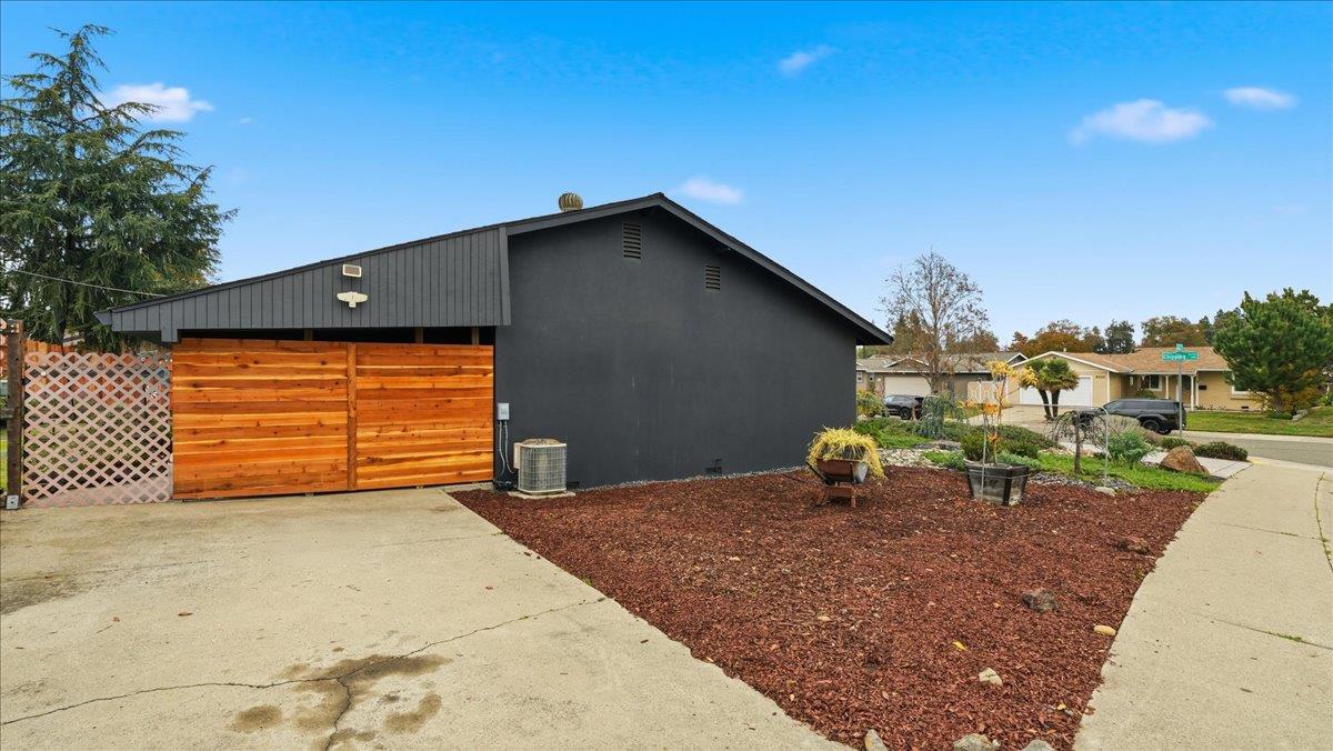 5701 Chipping Way Citrus Heights, CA 95621 - Photo 36 of 41 a backyard of a house with barbeque oven table and chairs