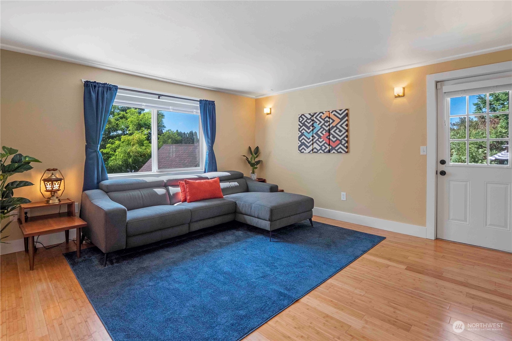 8845 24th Avenue Southwest Seattle, WA 98106 - Photo 5 of 22 a living room with furniture and a large window