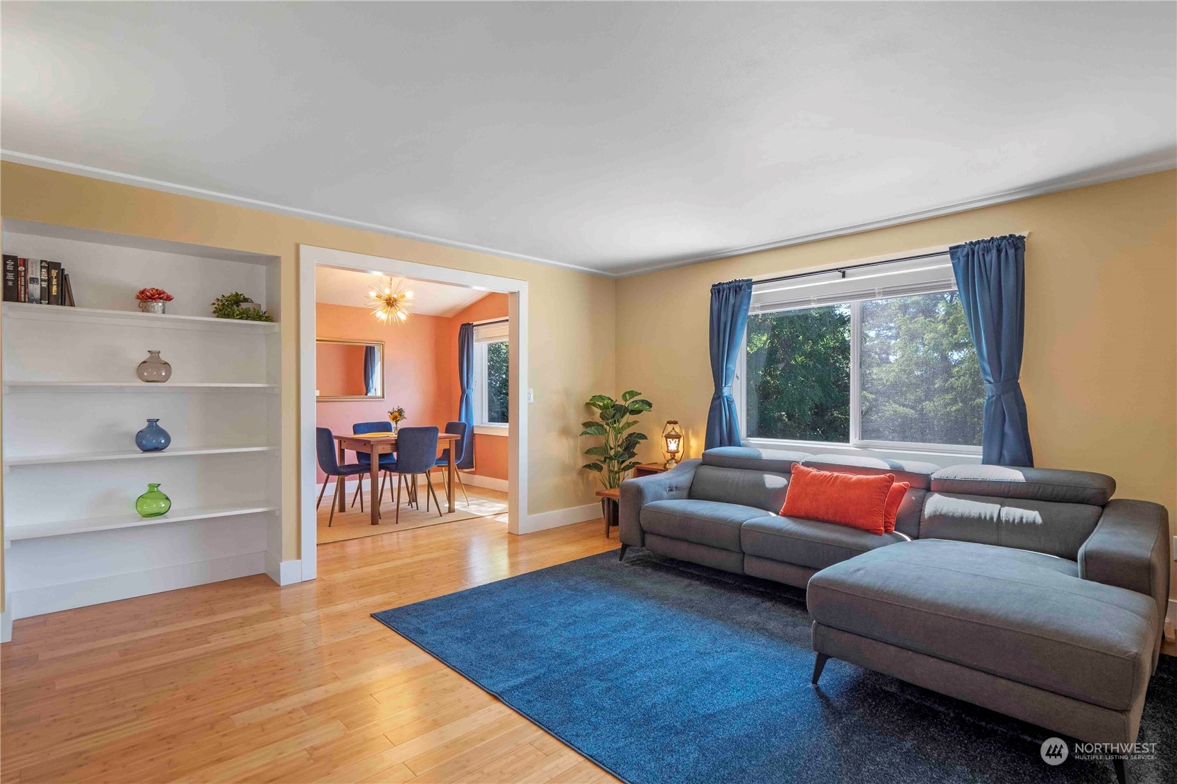 8845 24th Avenue Southwest Seattle, WA 98106 - Photo 6 of 22 a living room with furniture and wooden floor