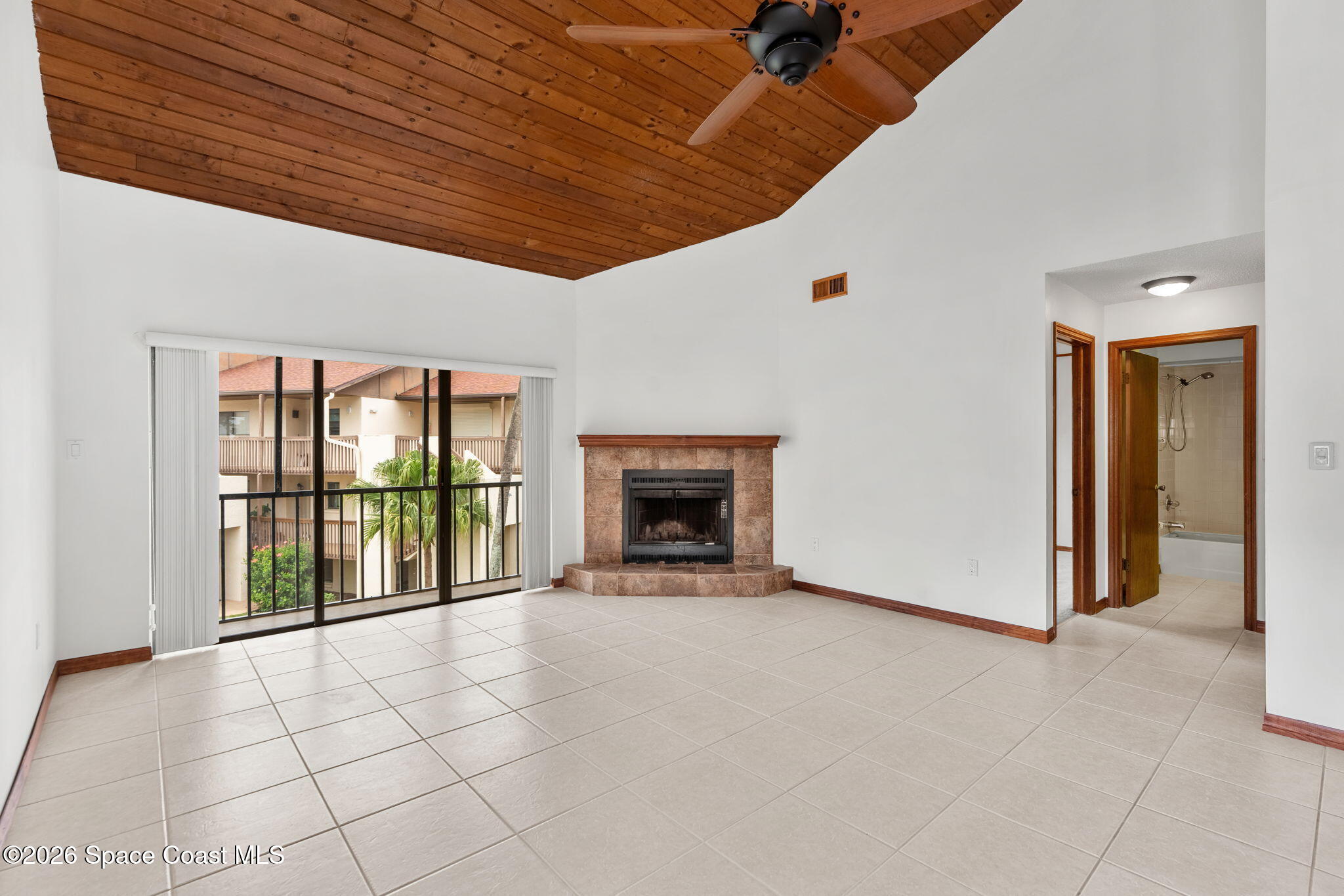 3121 Kirkland Road Northeast Palm Bay, FL 32905 - Photo 14 of 52 a view of an empty room with a fireplace